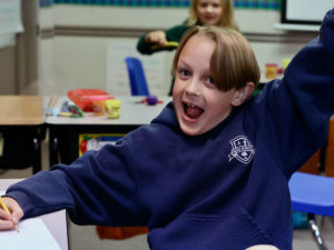 excited student grinning during class